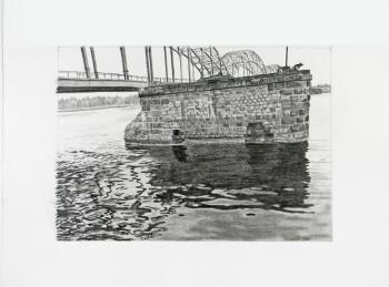 The remains of the old destroyed bridge over the Daugava River. Riga ( ). Shlyonskiy Vladimir