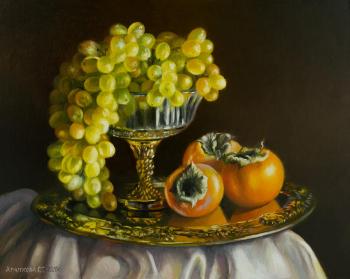 Still life with grapes and persimmons