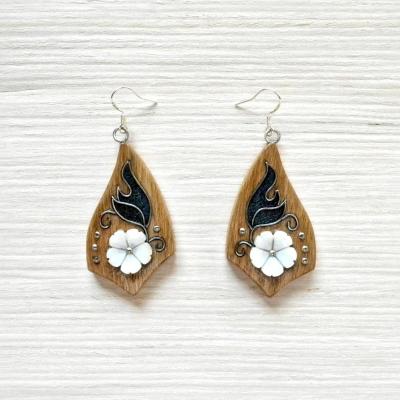 Earrings made of wood with mother of pearl