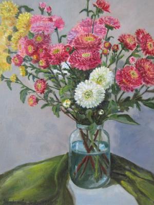 Chrysanthemums with green drapery