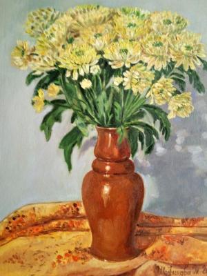 Yellow chrysanthemums in a vase. Schedrinova Tatyana