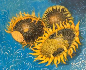 Sunflowers on a blue tablecloth