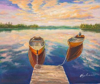 Boats on the mirror surface of the lake (Lake Mirror). Romm Alexandr