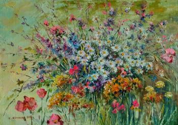 In the field behind flowers. Kruglova Svetlana