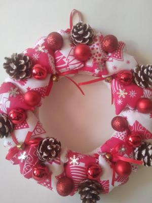 Christmas wreath with textile hearts and natural cones. Taran Diana