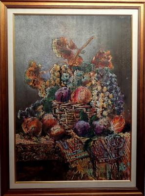 Fruit basket on the table. Borisov Mikhail