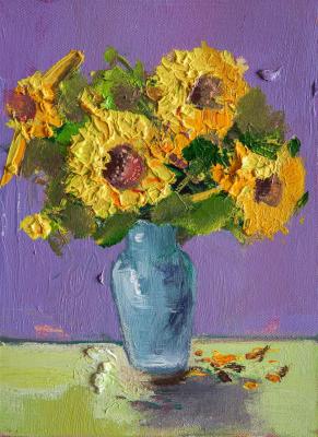 Bouquet of sunflowers in a blue vase. Gomes Liya