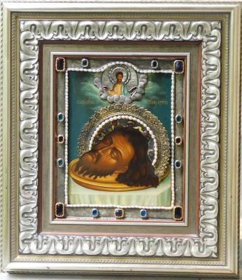 Beheading of the head of St. John the Baptist. St. John the Baptist (photo of the icon in the salary)