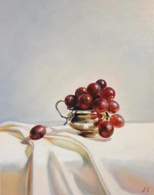 Grapes in a silver bowl. Bessonova Anna