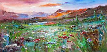 Meeting the dawn in the mountains. View of the poppy field. Rodries Jose