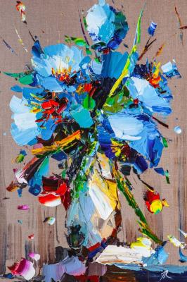 Blue flowers in a white vase (A Picture Of Flowers In A Vase). Rodries Jose