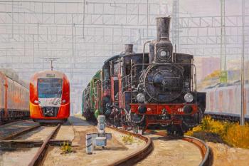 High-speed electric train "Swallow" and a freight locomotive. Kamskij Savelij