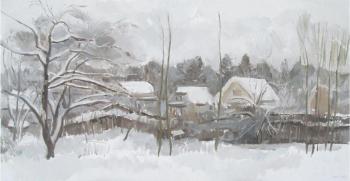 Snow-covered garden. Mashin Igor
