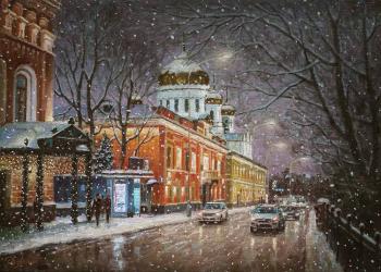 Snowflakes are swirling over the city quietly (). Razzhivin Igor
