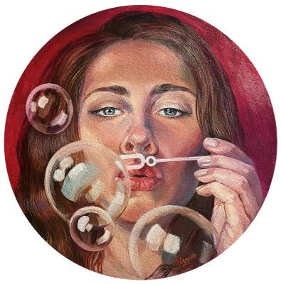 Portrait of a girl with bubble blowers. Veyner Nataliya