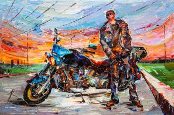 Motorcyclist at sunset (). Rodries Jose