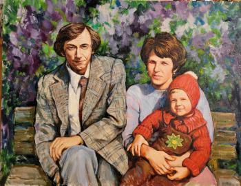 Family portrait in a lilac garden