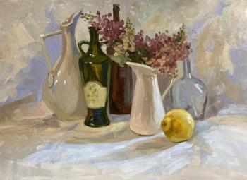Still life with lilac branch and one lemon