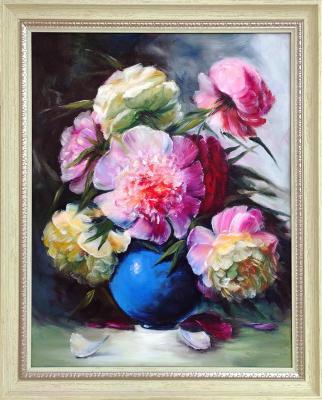 Bouquet of peonies in a blue vase