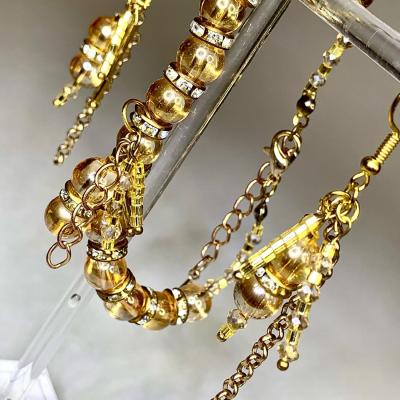 Set of handmade jewelry "Golden tassels". Temiraeva Alina