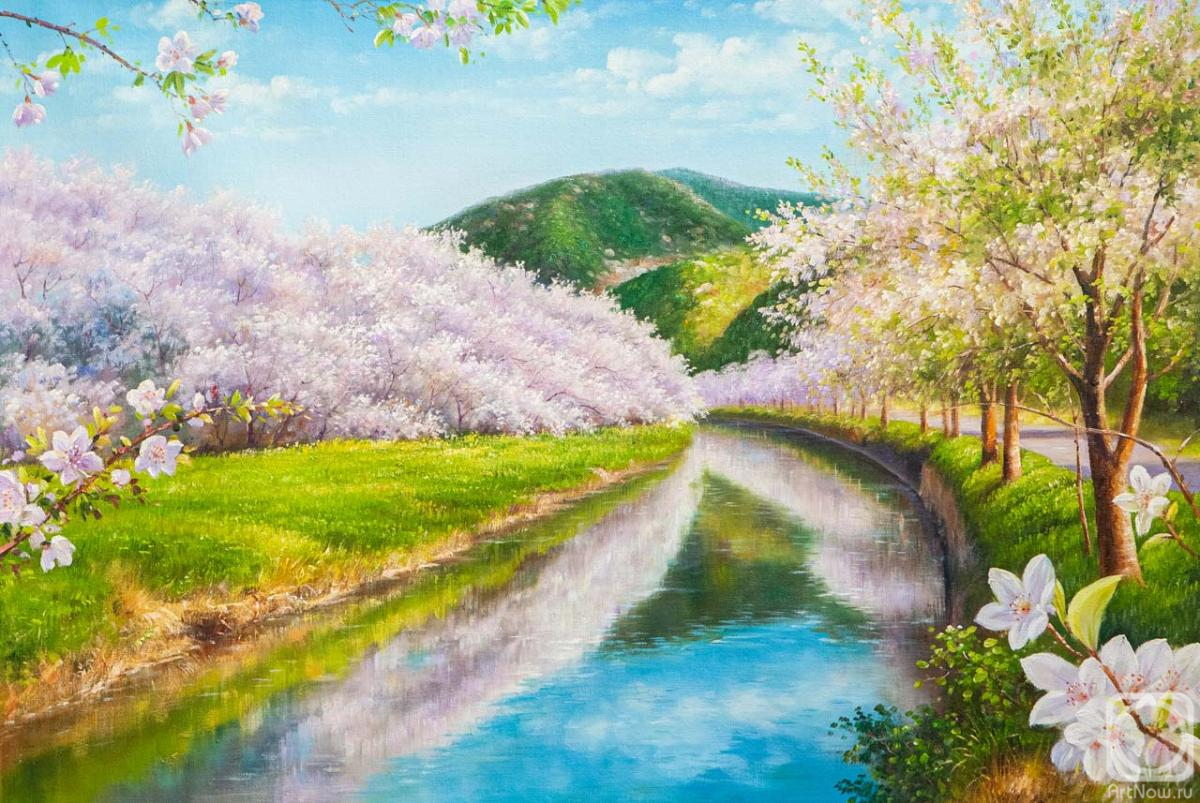 Romm Alexandr. Cherry blossoms against the backdrop of mountains