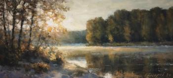 Autumn sunrise on the river. Gaiderov Michail