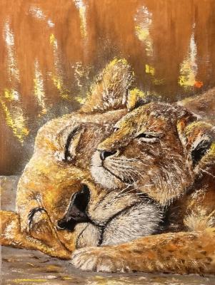 Lioness with a lion cub