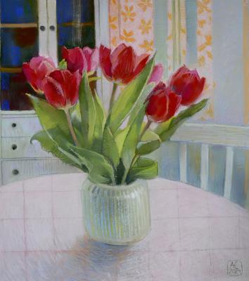 Still life with red tulips in a white vase on a white table. Sergeeva Aleksandra