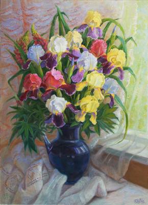 Irises in a blue vase