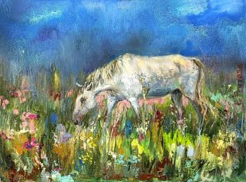 A white horse in a summer meadow (Horse Grazing). Reutova Elena