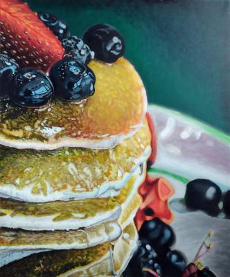 Pancakes in honey and berries