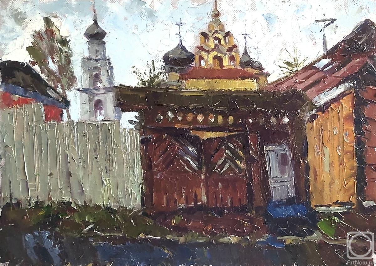 Silaeva Nina. Swing wooden gate with carved okhlyabin under a gable verf on Nekrasovskaya Street in the city of Kirzhach overlooking the Annunciation Monastery