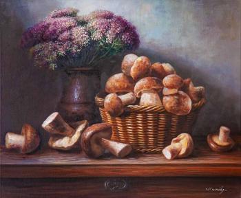 Still life with porcini mushrooms in a basket. Kamskij Savelij