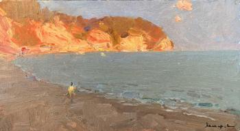 A sad cape in the rays of sunset. Makarov Vitaly