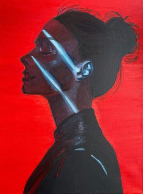 Light and shadow. Portrait of a woman in an urban atmosphere