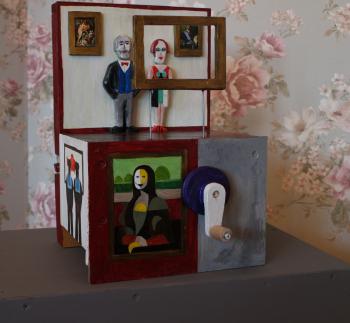 Spectators at a painting exhibition, moving sculpture. Ivashutin Sergey