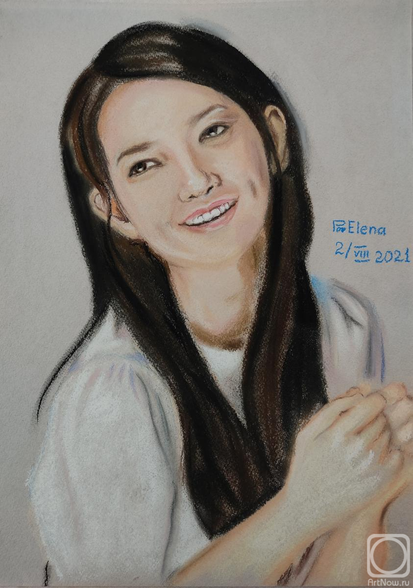 Povolokina Elena. Portrait of a smiling asian girl with long hair