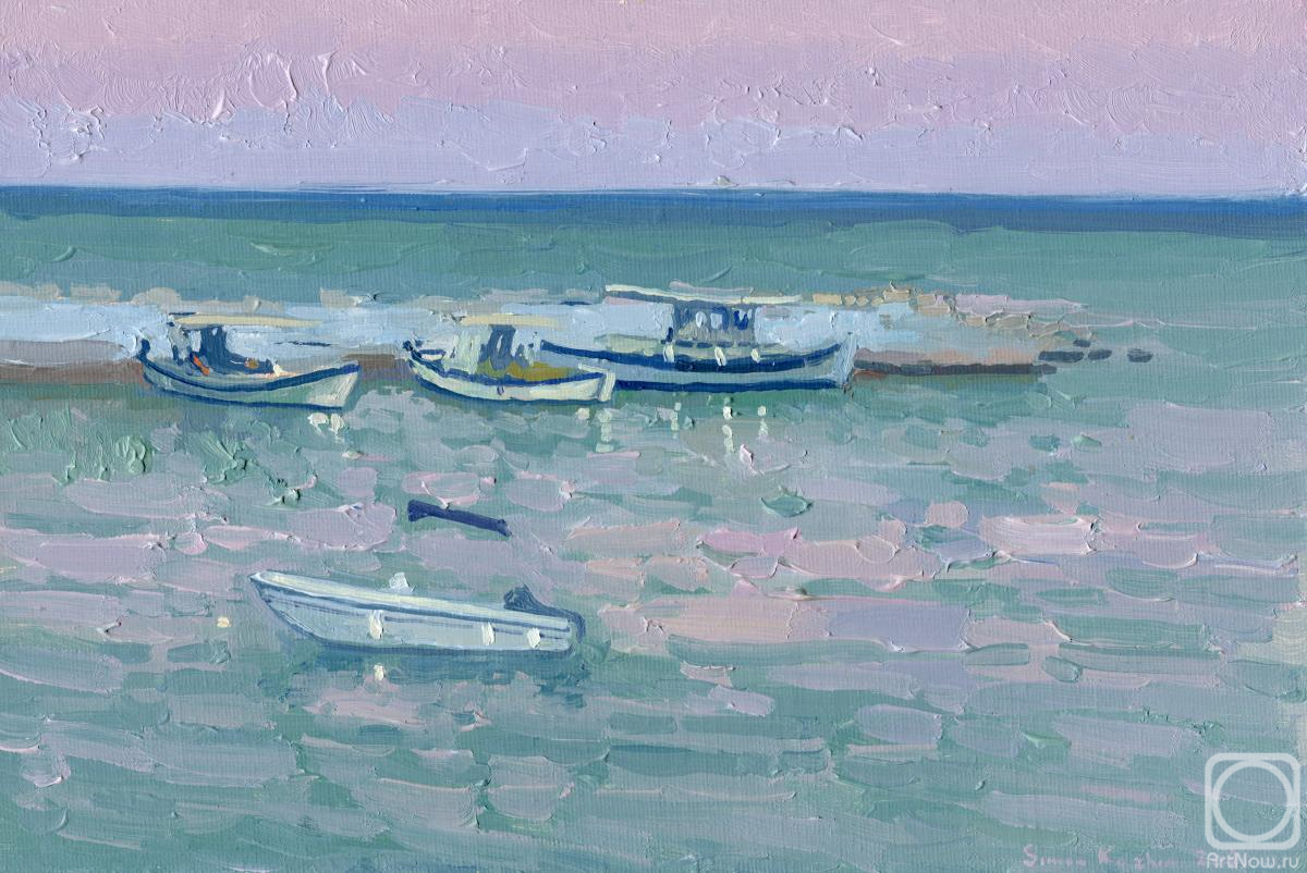 Kozhin Simon. It's getting dark in the port of Bali