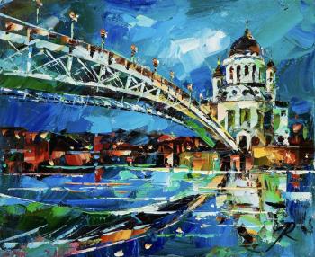 Reflected in the mirror of the river. Cathedral of Christ the Savior and Patriarchal Bridge