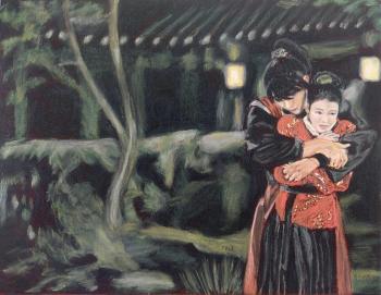 A man embraces a girl in the garden. Povolokina Elena