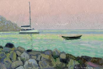 A boat and a yacht at sunset. Turunc