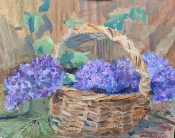 Basket with lilacs. Drobunin Nikolay