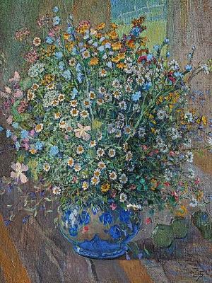 Bouquet of wildflowers in a blue pot