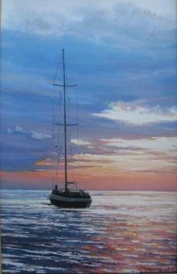 A yacht going into the sunset. Chernyshev Andrei