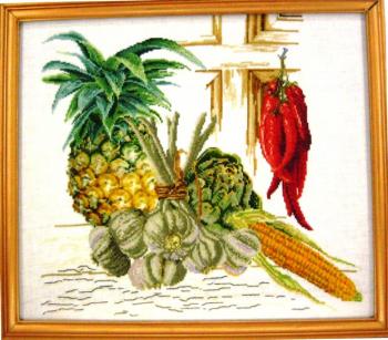 Still life with pineapple and peppers