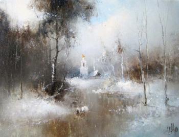 Beautiful winter landscape with a church. Medvedev Igor