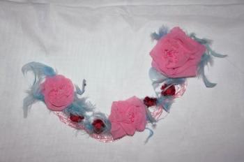 Roses with feathers (decoration for dresses, blouses)