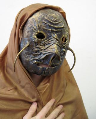 Mask for Halloween. Golden Pugo
