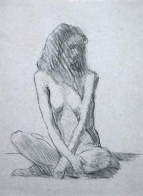 Sitting with her arms crossed