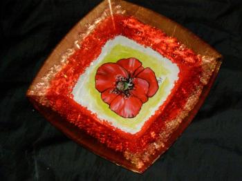 Plate with a poppy